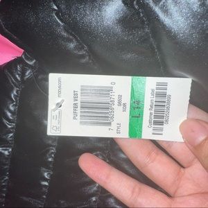 black winter vest with pink lining